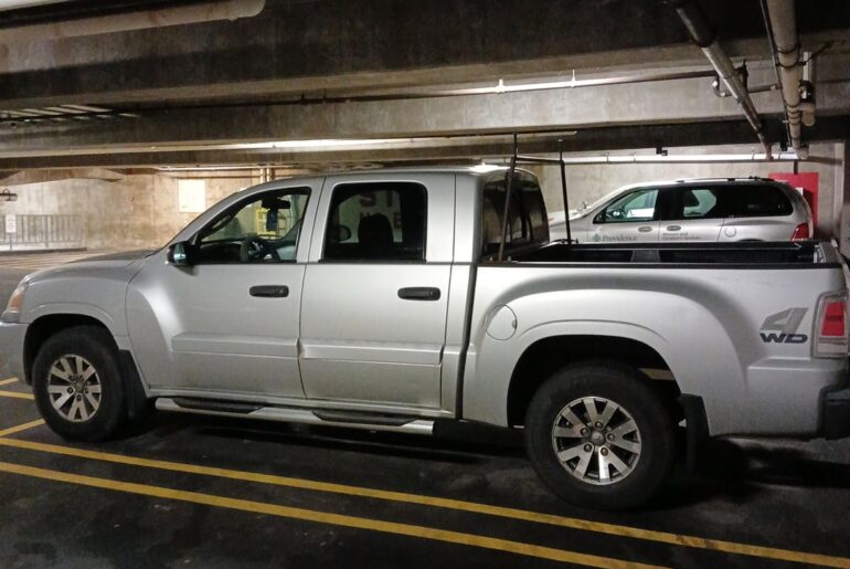 [Mitsubishi Raider] in a hospital parking garage