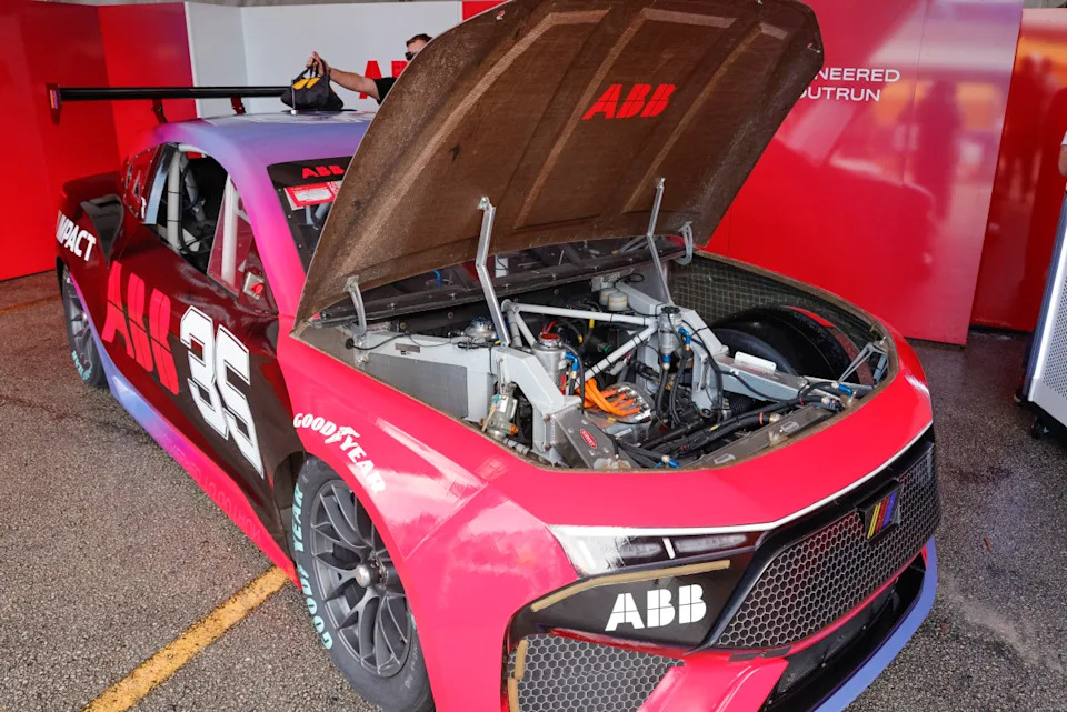 Apr 11, 2025; Miami, Florida, USA; ABB introduces the EV NASCAR prototype electric race car during a pre race press conference at the Homestead Miami Speedway. Mandatory Credit: Reinhold Matay-Imagn Images© Reinhold Matay-Imagn Images