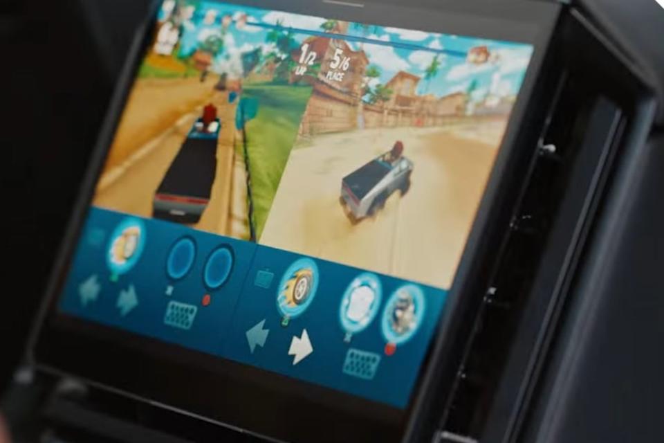 <p>2025 Tesla Cybertruck interior rear display split screen gaming</p>Tesla