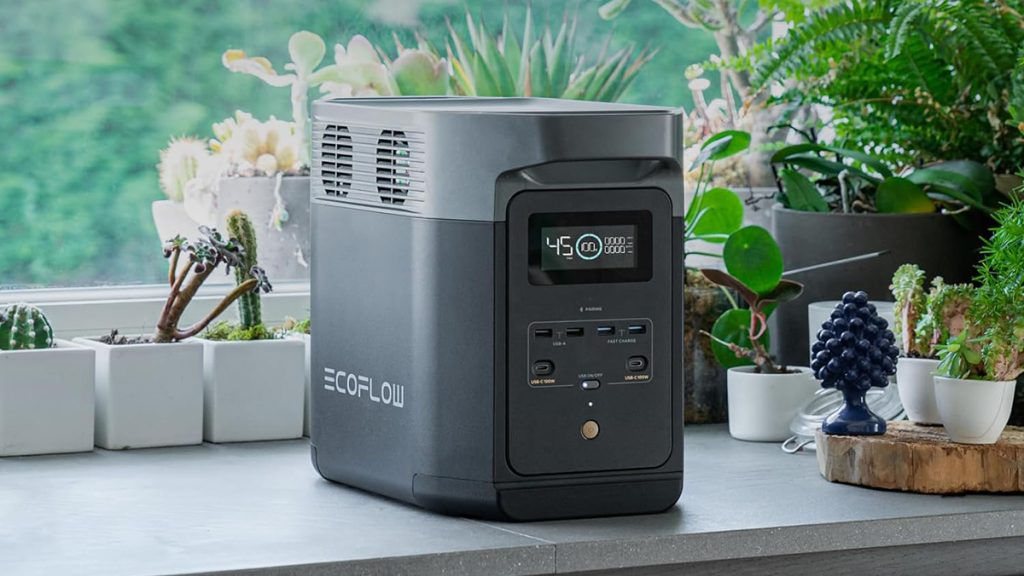 EcoFlow power station sitting in window with plants