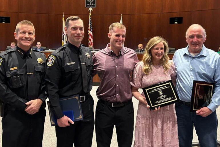 Naperville officer, citizens honored for saving driver from burning Tesla