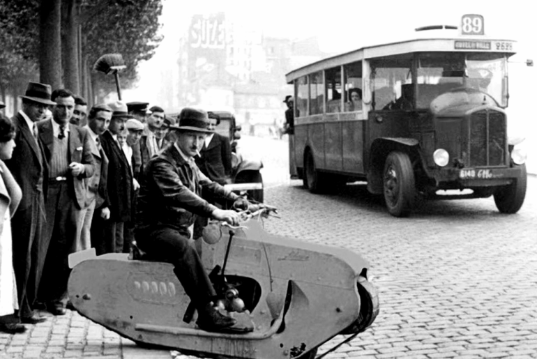 J. Lehaitre with his Tractor-Cycle in 1938. while not that fast (at just 25 mph) it could manage a wide range of terrain. He even created a version with machine gun.