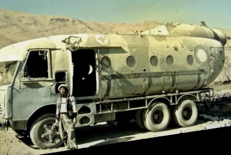 Afghani soldier makes bus out of downed Russian MI-8 helicopter