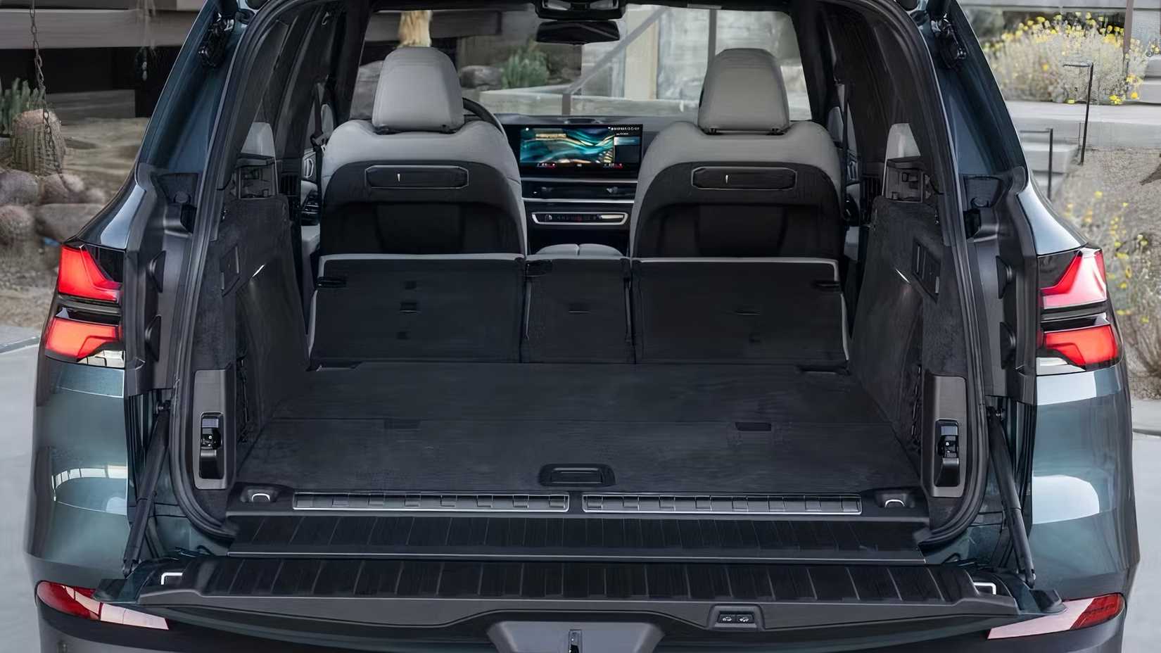 2025 BMW X5 cargo area showing rear seats folded flat