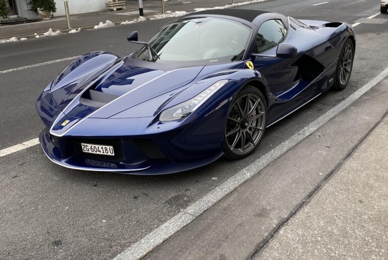The holy grail: [Ferrari LaFerrari Aperta] in the local town.