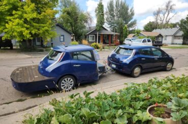 A Leaf towing a Leafette with a deck