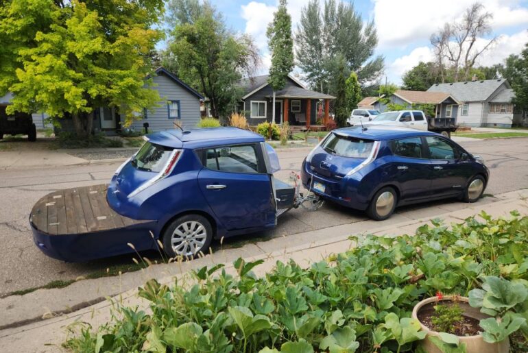 A Leaf towing a Leafette with a deck