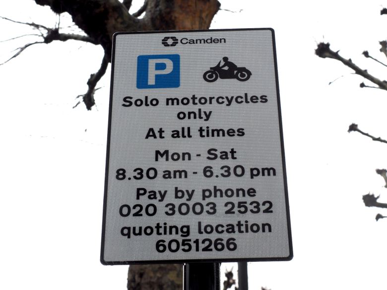 Sign says solo motorcycles only at at all times Monday to Saturday, pay by phone.
