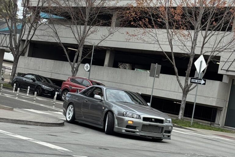My first time spotting an [R34 Nissan Skyline] in the wild outside of Monterey Car Week 😮‍💨 this was randomly in downtown Sacramento