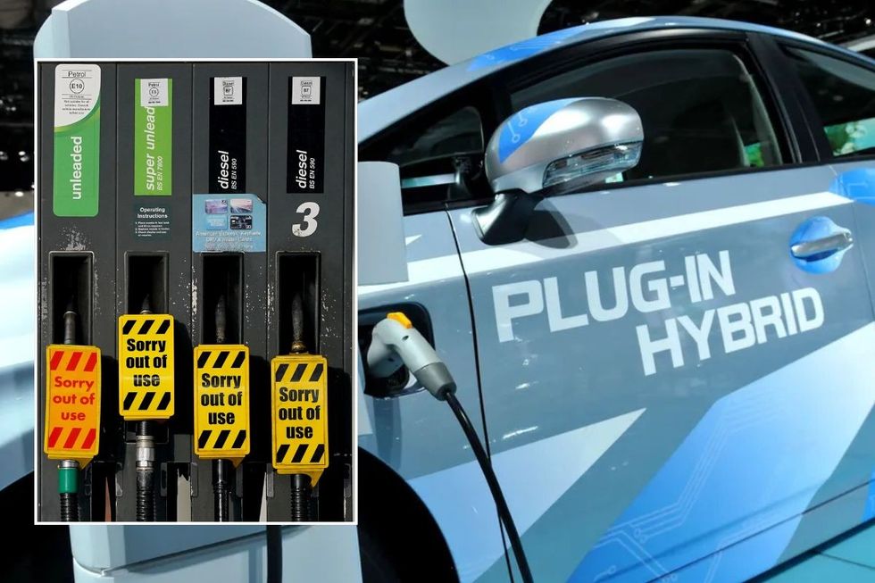 Out of use petrol and diesel pumps and a plug-in hybrid vehicle being charged