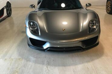 Silver Porsche 918, the picture includes a Koenigsegg One:1 on the right, 1 of 7 including a manufacturer car. And with a Ferrari Sergio 1 or 6 on the opposite side. 3024x4032