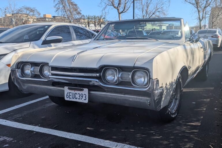 1967 Oldsmobile Cutlass Convertible at Marshalls Parking lot