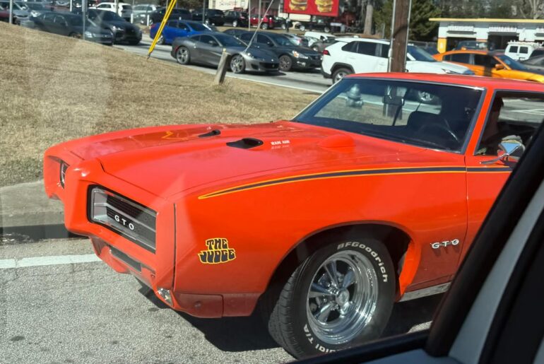 [69 Pontiac GTO Judge] seen in traffic