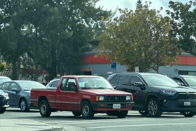 An nice old red Mitsubishi Mighty Max and more random cars spotted today.
