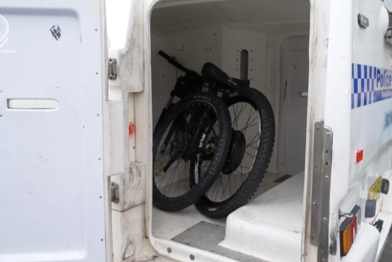 Two teens seriously injured after e-bike crashes into car, rider and passenger thrown off vehicle