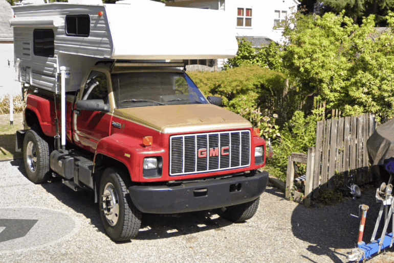 Short bed, single cab, gas engine GMC TopKick pickup conversion, official car of?