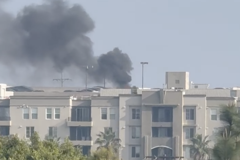 Rooftop Tesla Cybertruck catches fire