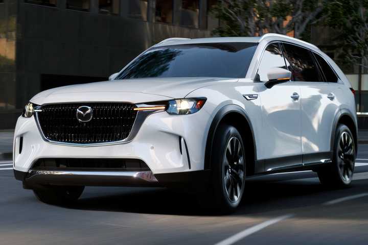 2025 Mazda CX-90 White Front Angled View Driving