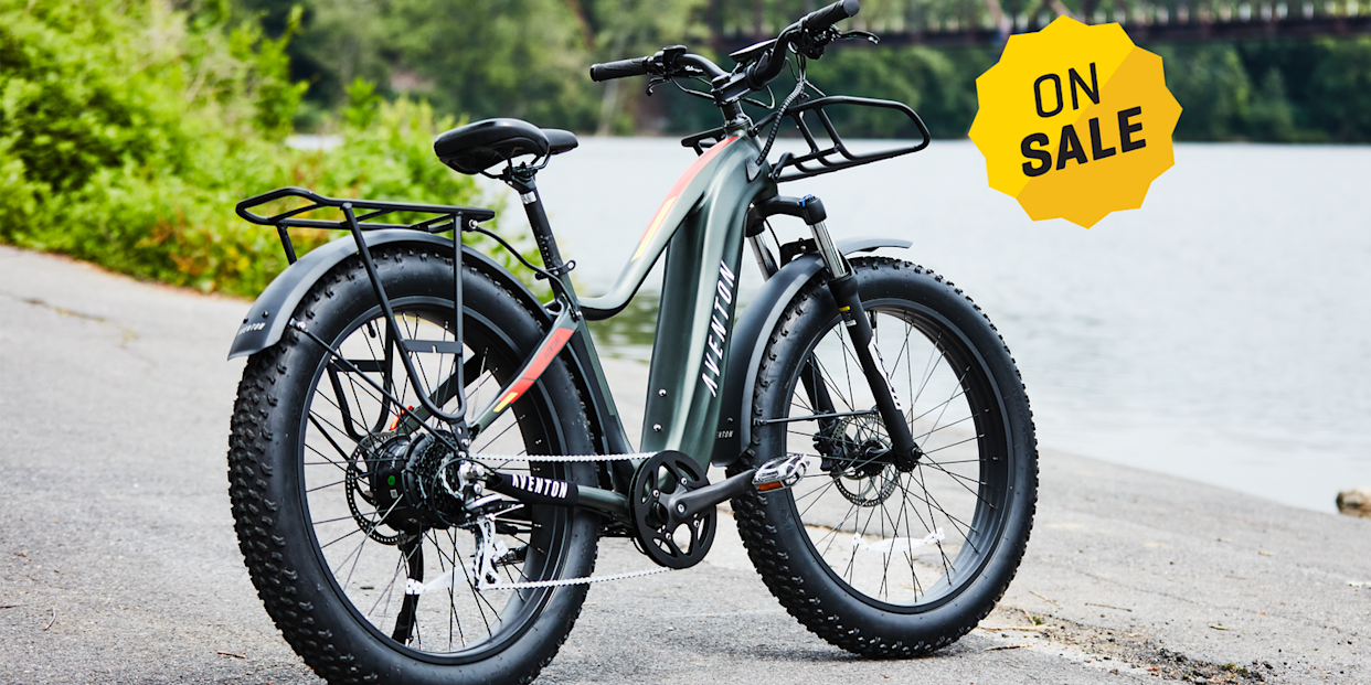 electric bicycle with large tires and promotional on sale graphic