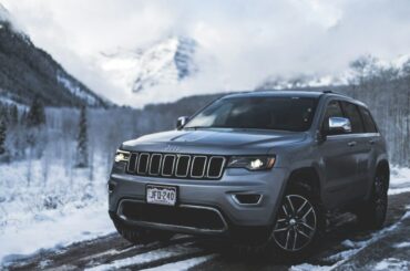 gray Jeep SUV parked on road