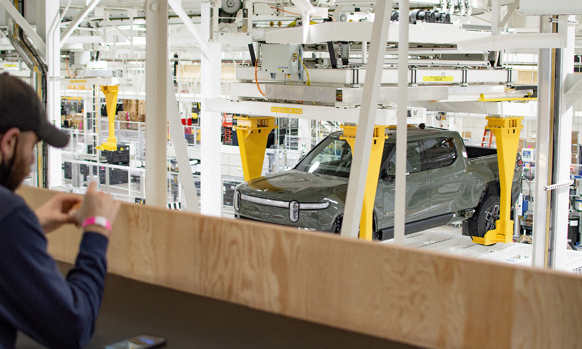Rivian truck being manufactured in a factory.