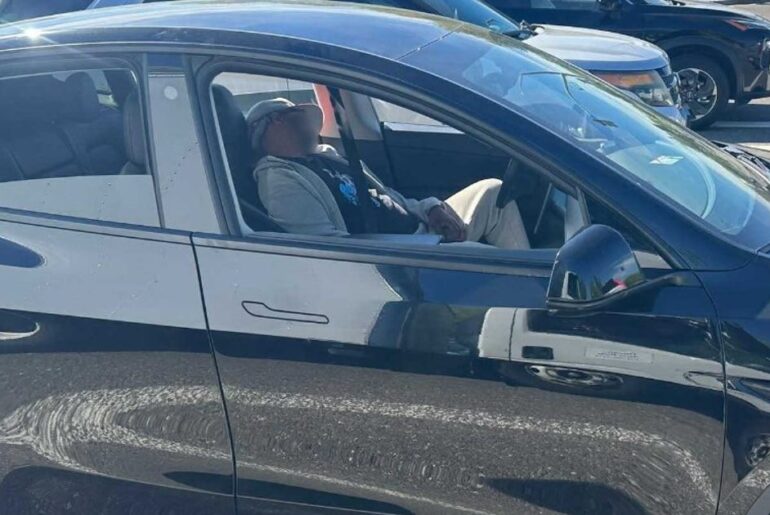 Man passed out in Tesla driving through California city: police