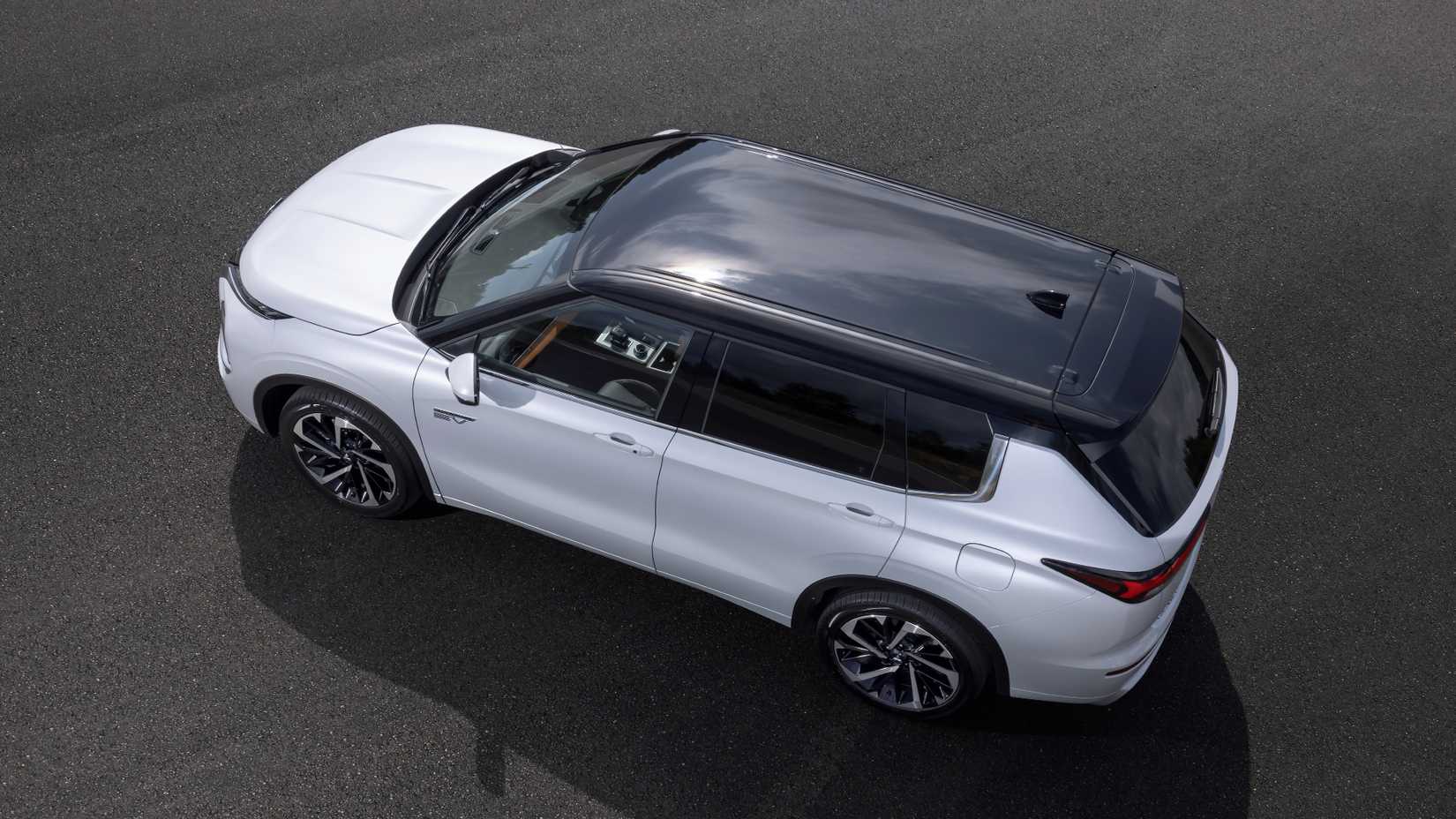 Exterior overhead shot of a white 2025 Outlander PHEV 