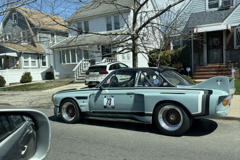 [modified bmw] parked outside in queens