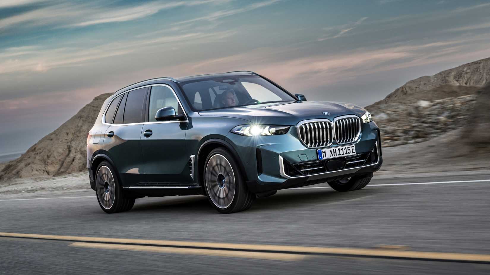 The 2024 BMW X5 xDrive50e on a highway