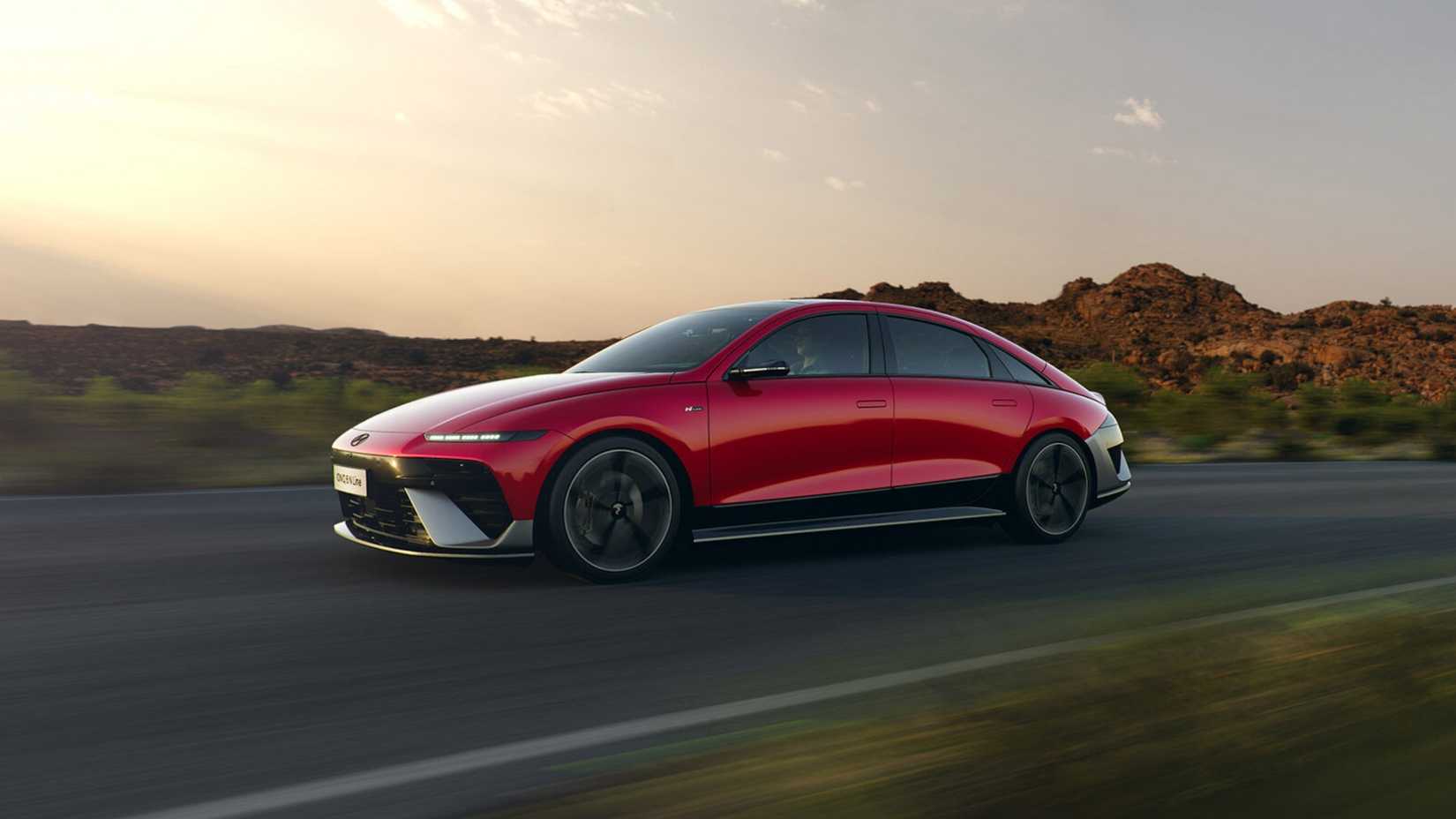 2026 Hyundai Ioniq 6 Red Front Angled View Driving