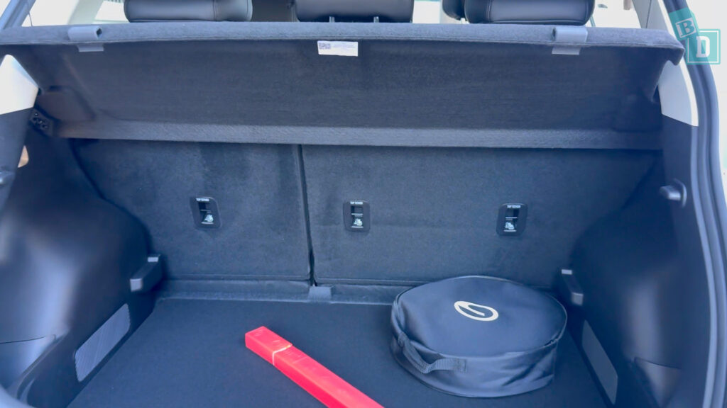 Boot floor lowered showing extra storage depth for charging cables