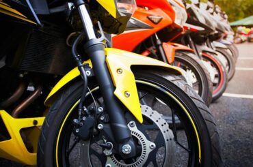 Motorcycles standing in a row