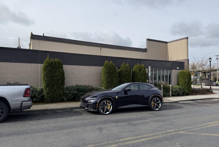 A [Ferrari Purosangue] street parked in downtown Tigard, Oregon.
