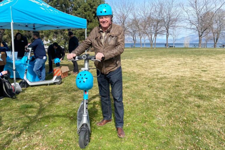Penticton Mayor Julius Bloomfield gears up to test a Bird Canada electric scooter inside Marina Way Park on March 27, 2026. (Logan Lockhart/Western News)