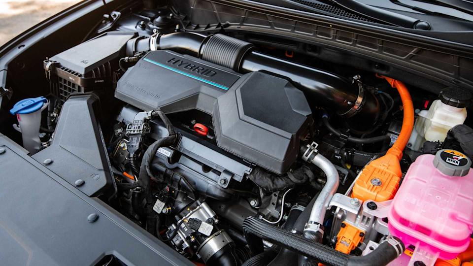 Shot of the engine under the hood of a 2026 Hyundai Tucson Hybrid.