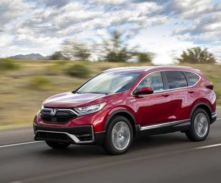 2020 Honda CR-V Hybrid Exterior Driving Down A Road