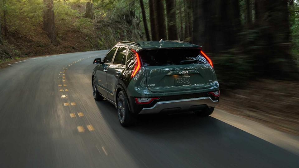 Rear 3/4 action shot of a 2025 Kia Niro