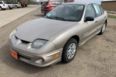 2002 Pontiac Sunfire with 4 doors and Manual Windows, the official car of...?