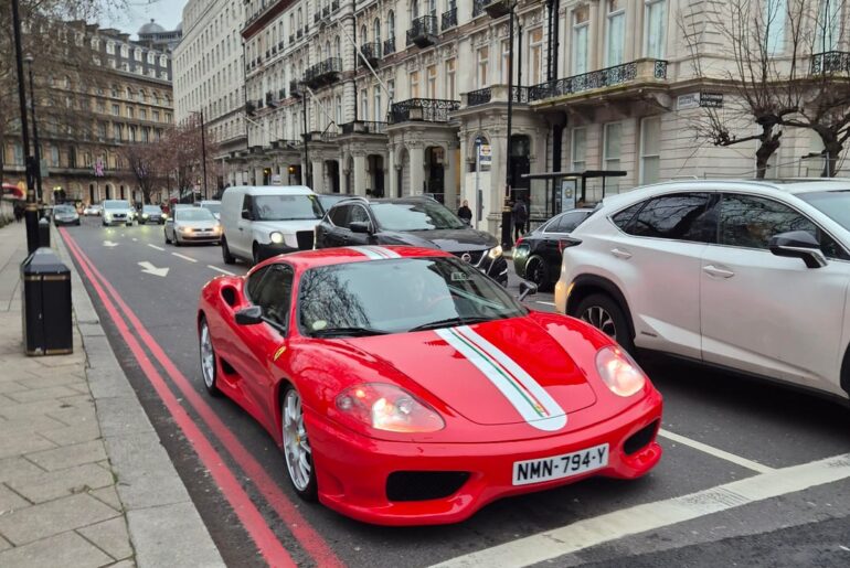 Helped push a broken down car off the road and got the timing to see this [Ferrari challenge stradale]