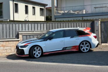 [Audi RS6 Avant GT] parked on the side of the road.