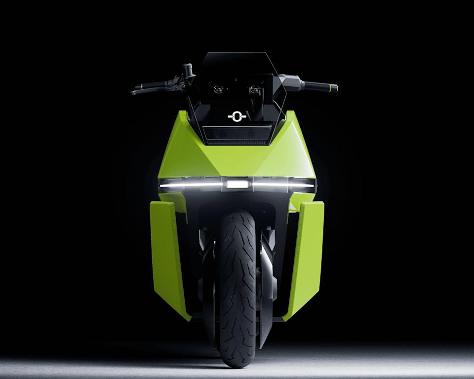 Front view of a lime green electric motorcycle with a single headlight strip and black handlebars against a black background.