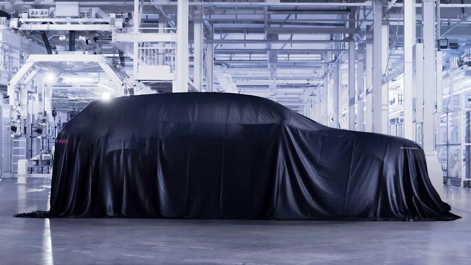 A teaser of Bentley's 2027-bound electric SUV.