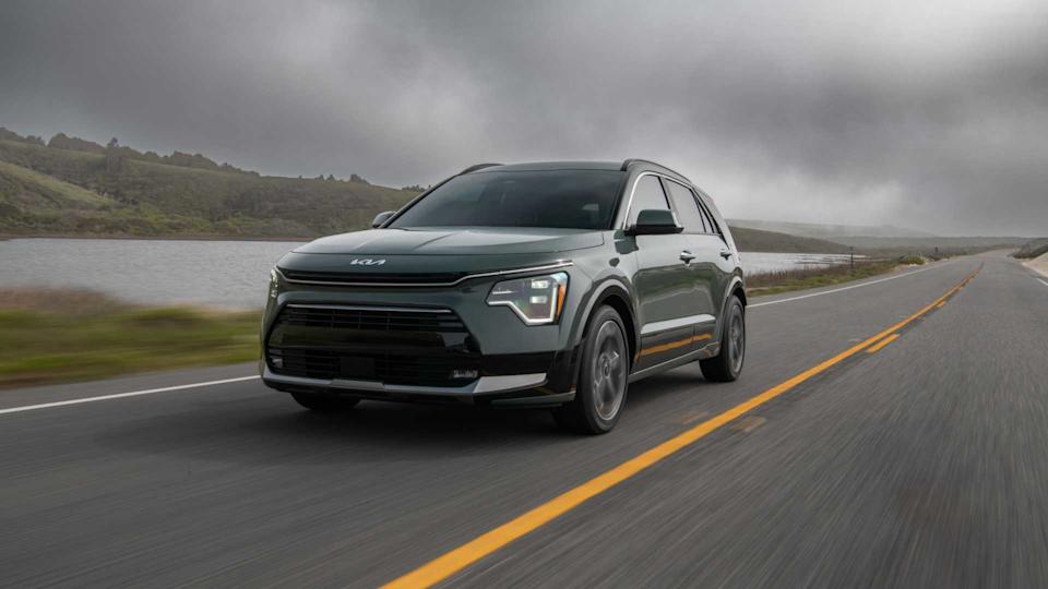 Front 3/4 action shot of a 2025 Kia Niro
