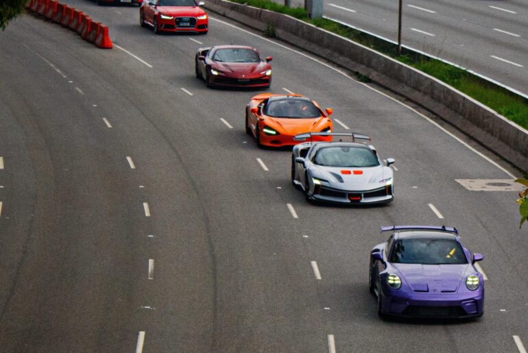 Look at this [multi] convoy I found — featuring [Ferrari SF90 XX], [McLaren 750S], [Ferrari Purosangue], [porsche gt3], and [Audi RS6].