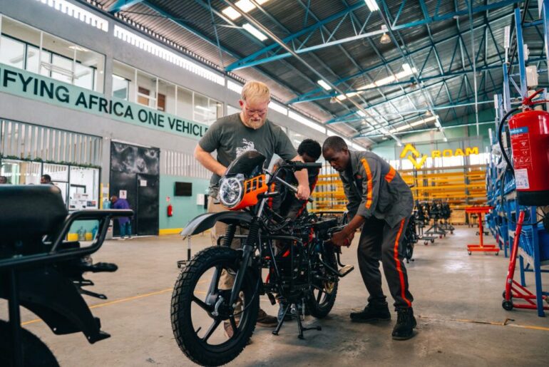 CSU student Wesley Holmes (left) is working with Roam in Nairobi, Kenya, as part of a collaborative program.