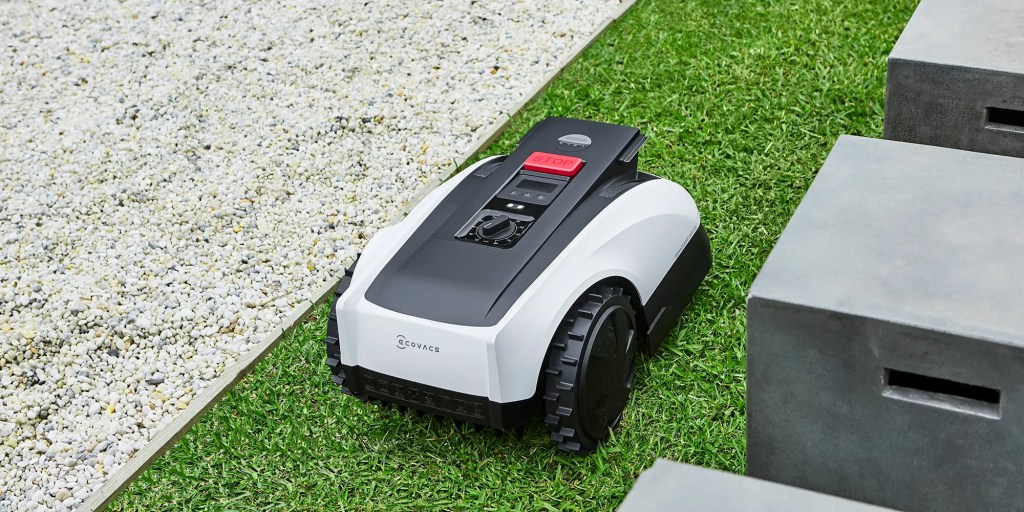 ECOVACS robot lawn mower in grass