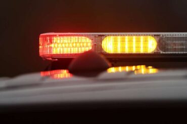 FILE - Police lights....
