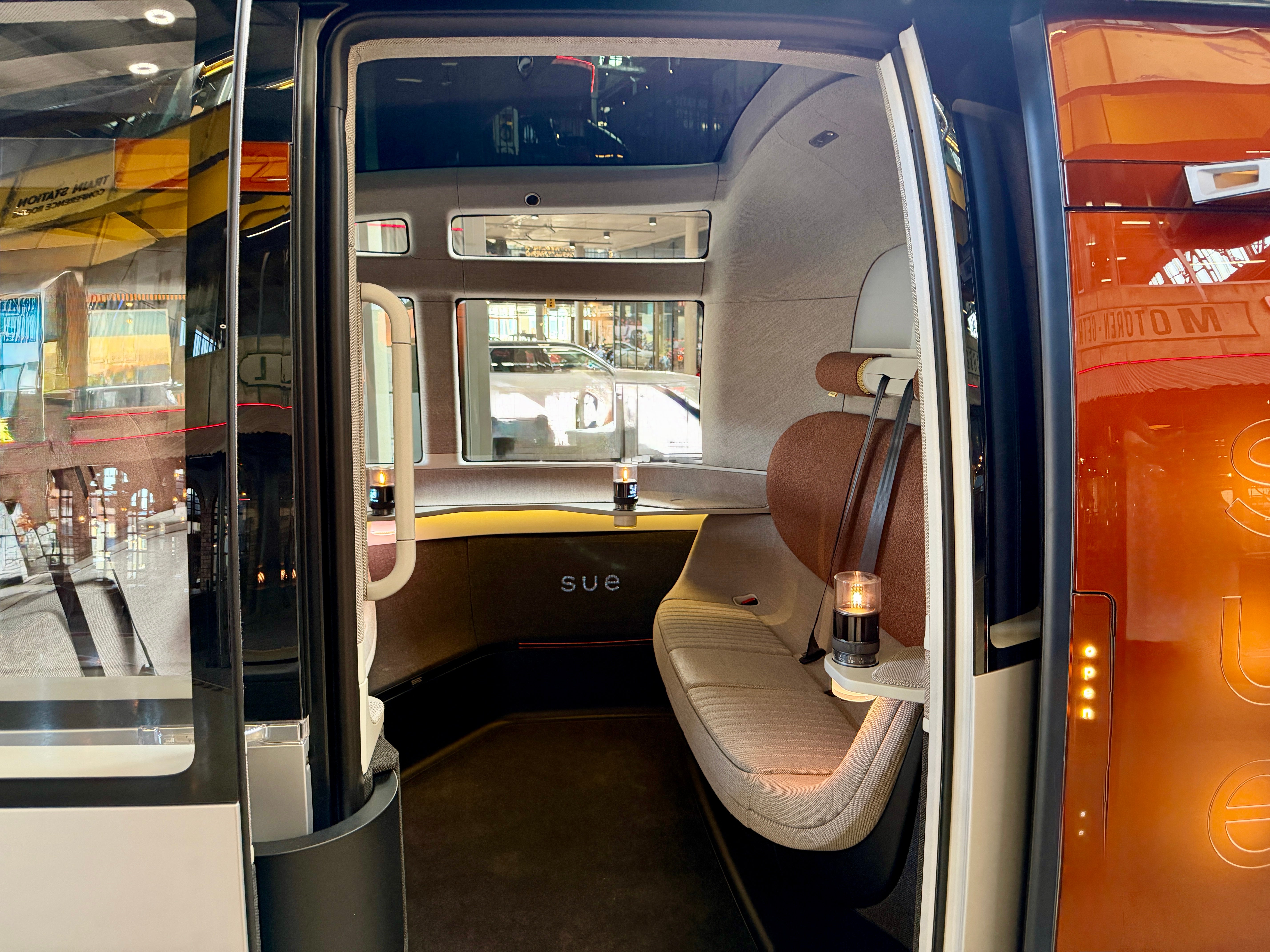 Access to Sue is through welcoming doors, with the side of the vehicle designed as its front