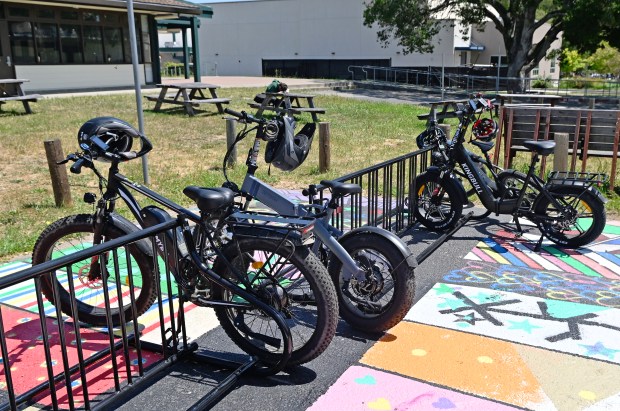 E-bikes occupy a parking rack at San Marin High School in Novato, Calif., on Thursday, May 1, 2025. (Alan Dep/Marin Independent Journal)