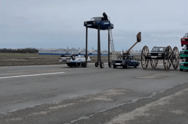 Drag Race with vehicles that look to be from a 6-year-old's sketchbook